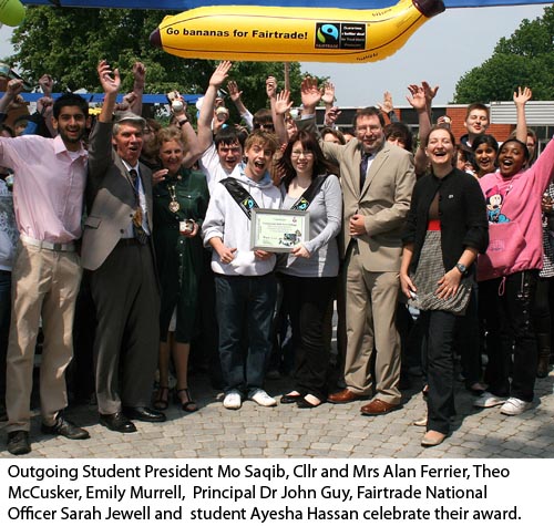 Award presentation picture in quad